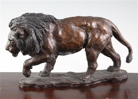 A 20th century bronze model of a lion, length 14.5in.